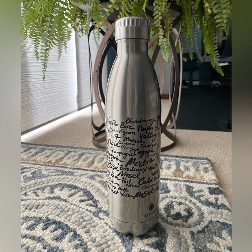 Manna silver 750ml bottle with wine theme - NWOT